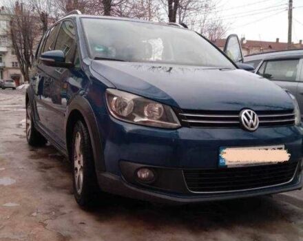 Синий Фольксваген Туран, объемом двигателя 1.4 л и пробегом 230 тыс. км за 8800 $, фото 1 на Automoto.ua