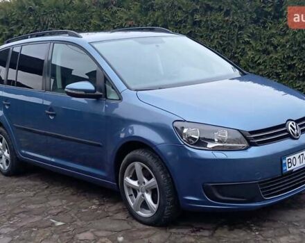 Синий Фольксваген Туран, объемом двигателя 1.2 л и пробегом 160 тыс. км за 7650 $, фото 1 на Automoto.ua