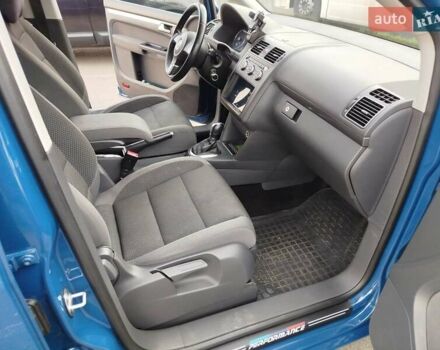 Синий Фольксваген Туран, объемом двигателя 2 л и пробегом 292 тыс. км за 11700 $, фото 28 на Automoto.ua