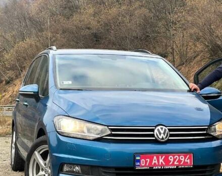Синий Фольксваген Туран, объемом двигателя 1.6 л и пробегом 218 тыс. км за 17950 $, фото 1 на Automoto.ua