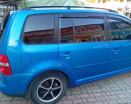 Синий Фольксваген Туран, объемом двигателя 1.6 л и пробегом 229 тыс. км за 5000 $, фото 1 на Automoto.ua