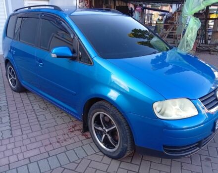 Синий Фольксваген Туран, объемом двигателя 1.6 л и пробегом 229 тыс. км за 5000 $, фото 7 на Automoto.ua