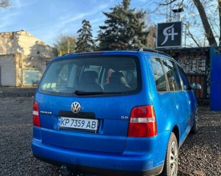 Синий Фольксваген Туран, объемом двигателя 2 л и пробегом 276 тыс. км за 5500 $, фото 1 на Automoto.ua