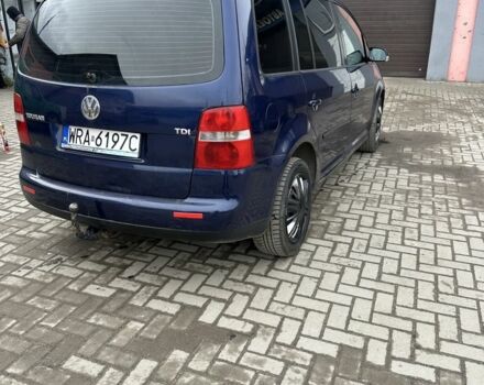 Синий Фольксваген Туран, объемом двигателя 2 л и пробегом 380 тыс. км за 1800 $, фото 2 на Automoto.ua