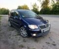 Синій Фольксваген Туран, об'ємом двигуна 2 л та пробігом 248 тис. км за 3513 $, фото 1 на Automoto.ua