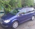 Синій Фольксваген Туран, об'ємом двигуна 1.4 л та пробігом 209 тис. км за 5900 $, фото 1 на Automoto.ua
