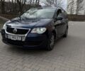 Синий Фольксваген Туран, объемом двигателя 1.4 л и пробегом 228 тыс. км за 6450 $, фото 1 на Automoto.ua