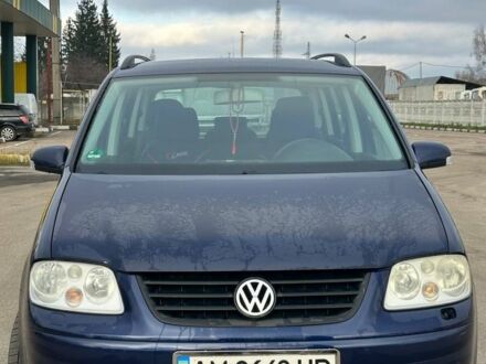 Синий Фольксваген Туран, объемом двигателя 1.6 л и пробегом 250 тыс. км за 5000 $, фото 1 на Automoto.ua