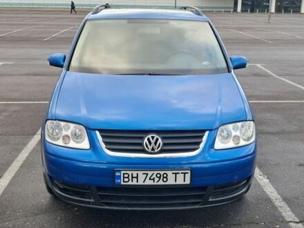 Синий Фольксваген Туран, объемом двигателя 1.6 л и пробегом 260 тыс. км за 5500 $, фото 1 на Automoto.ua