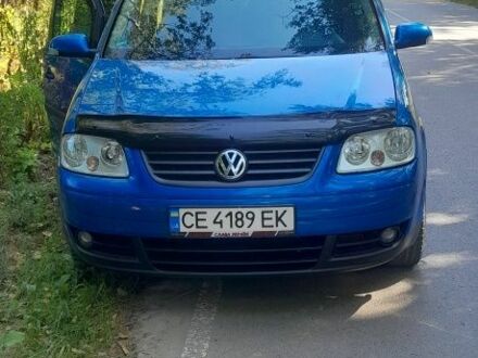 Синий Фольксваген Туран, объемом двигателя 1.6 л и пробегом 214 тыс. км за 5600 $, фото 1 на Automoto.ua
