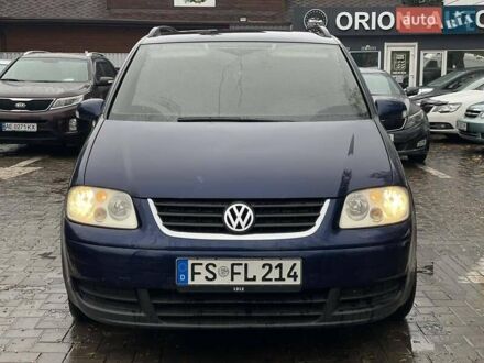 Синий Фольксваген Туран, объемом двигателя 1.9 л и пробегом 228 тыс. км за 3999 $, фото 1 на Automoto.ua