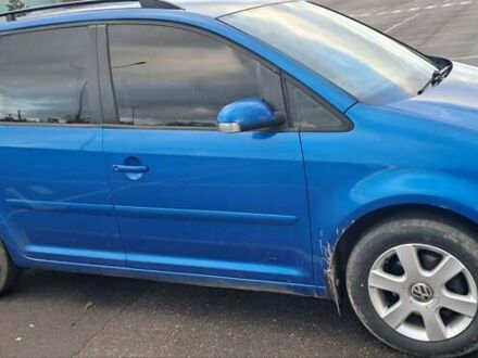 Синий Фольксваген Туран, объемом двигателя 1.6 л и пробегом 261 тыс. км за 5500 $, фото 1 на Automoto.ua