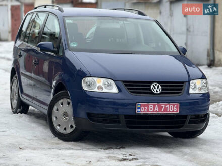 Синий Фольксваген Туран, объемом двигателя 1.6 л и пробегом 206 тыс. км за 6200 $, фото 1 на Automoto.ua