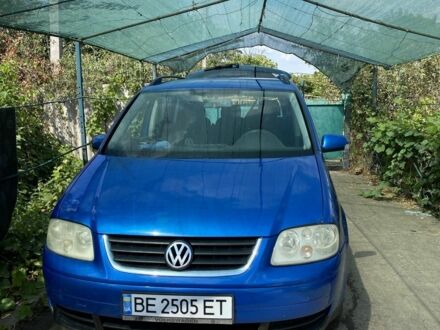 Синий Фольксваген Туран, объемом двигателя 1.6 л и пробегом 270 тыс. км за 5400 $, фото 1 на Automoto.ua