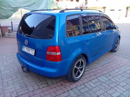 Синий Фольксваген Туран, объемом двигателя 1.6 л и пробегом 229 тыс. км за 5000 $, фото 1 на Automoto.ua