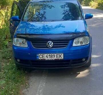 Синий Фольксваген Туран, объемом двигателя 1.6 л и пробегом 213 тыс. км за 5600 $, фото 1 на Automoto.ua