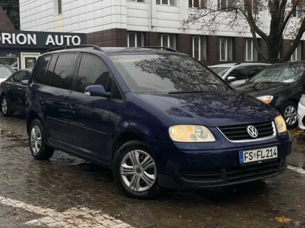 Синий Фольксваген Туран, объемом двигателя 1.9 л и пробегом 228 тыс. км за 3999 $, фото 1 на Automoto.ua