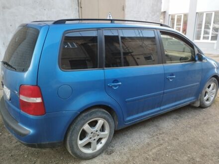 Синій Фольксваген Туран, об'ємом двигуна 1.9 л та пробігом 240 тис. км за 4800 $, фото 1 на Automoto.ua