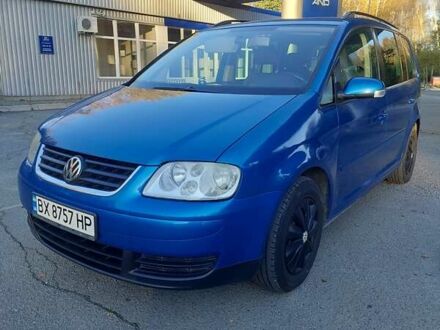 Синий Фольксваген Туран, объемом двигателя 1.6 л и пробегом 242 тыс. км за 5800 $, фото 1 на Automoto.ua