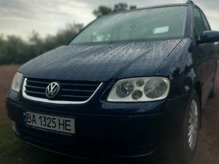 Синій Фольксваген Туран, об'ємом двигуна 1.6 л та пробігом 215 тис. км за 5800 $, фото 1 на Automoto.ua