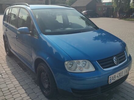 Синий Фольксваген Туран, объемом двигателя 1.6 л и пробегом 230 тыс. км за 5000 $, фото 1 на Automoto.ua