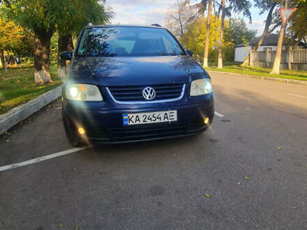 Синій Фольксваген Туран, об'ємом двигуна 1.98 л та пробігом 391 тис. км за 4300 $, фото 1 на Automoto.ua