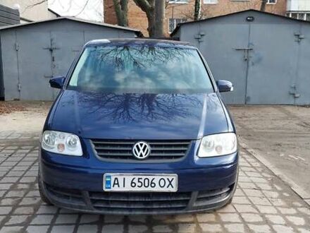 Синій Фольксваген Туран, об'ємом двигуна 1.6 л та пробігом 203 тис. км за 6000 $, фото 1 на Automoto.ua