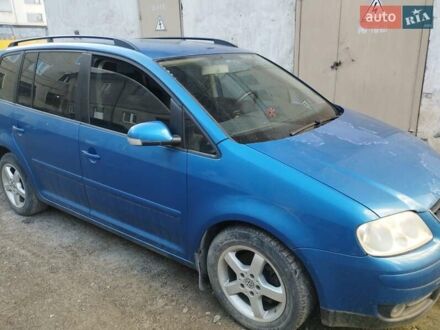 Синий Фольксваген Туран, объемом двигателя 1.9 л и пробегом 250 тыс. км за 4800 $, фото 1 на Automoto.ua