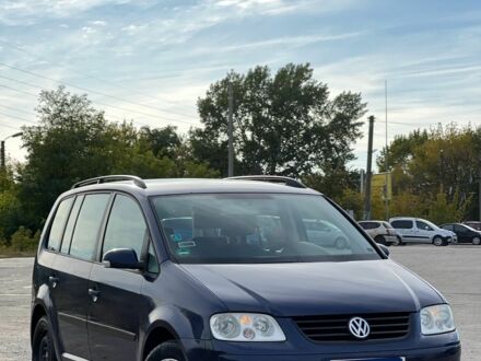 Синий Фольксваген Туран, объемом двигателя 2 л и пробегом 300 тыс. км за 2800 $, фото 1 на Automoto.ua