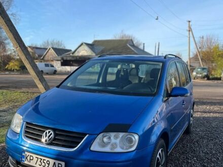 Синий Фольксваген Туран, объемом двигателя 2 л и пробегом 276 тыс. км за 5500 $, фото 1 на Automoto.ua
