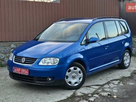 Синий Фольксваген Туран, объемом двигателя 1.6 л и пробегом 221 тыс. км за 6399 $, фото 1 на Automoto.ua