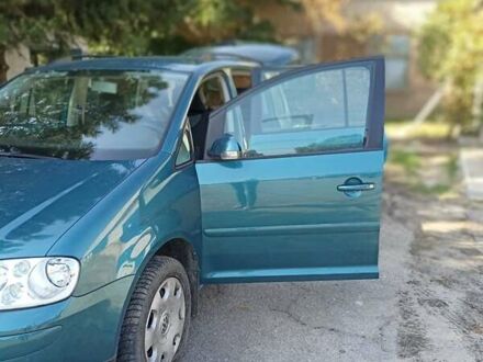 Фольксваген Туран 2004 у Запоріжжя на Automoto.ua Синій Фольксваген Туран, об'ємом двигуна 1.6 л та пробігом 228 тис. км за 6500 $, фото 1 на Automoto.ua