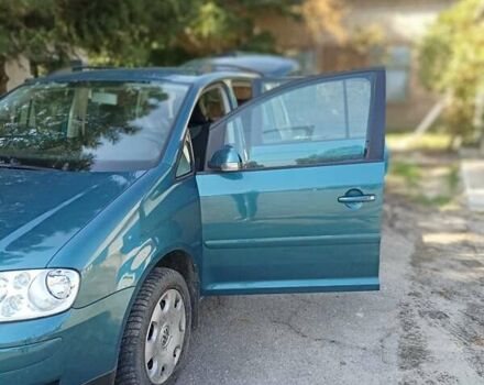 Синій Фольксваген Туран, об'ємом двигуна 1.6 л та пробігом 228 тис. км за 6500 $, фото 1 на Automoto.ua