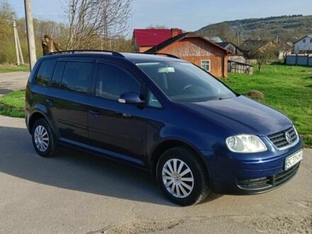 Фольксваген Туран 2005 у Дрогобичі на Automoto.ua Синій Фольксваген Туран, об'ємом двигуна 1.6 л та пробігом 231 тис. км за 5200 $, фото 1 на Automoto.ua
