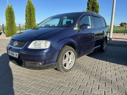 Фольксваген Туран 2005 в Ровно на Automoto.ua Синий Фольксваген Туран, объемом двигателя 2 л и пробегом 321 тыс. км за 6700 $, фото 1 на Automoto.ua