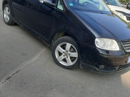 Синий Фольксваген Туран, объемом двигателя 2 л и пробегом 383 тыс. км за 4500 $, фото 1 на Automoto.ua