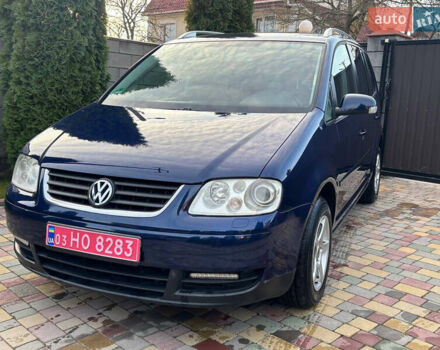Синий Фольксваген Туран, объемом двигателя 1.6 л и пробегом 251 тыс. км за 6700 $, фото 1 на Automoto.ua