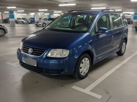 Синий Фольксваген Туран, объемом двигателя 2 л и пробегом 280 тыс. км за 3500 $, фото 1 на Automoto.ua
