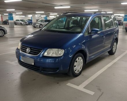 Синий Фольксваген Туран, объемом двигателя 2 л и пробегом 280 тыс. км за 3500 $, фото 1 на Automoto.ua