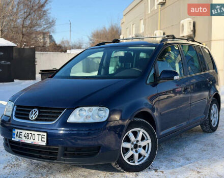 Синий Фольксваген Туран, объемом двигателя 1.6 л и пробегом 310 тыс. км за 5100 $, фото 1 на Automoto.ua
