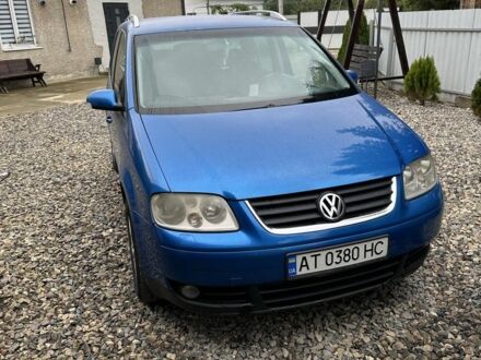 Синий Фольксваген Туран, объемом двигателя 2 л и пробегом 490 тыс. км за 4300 $, фото 1 на Automoto.ua