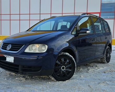 Синий Фольксваген Туран, объемом двигателя 2 л и пробегом 297 тыс. км за 2457 $, фото 1 на Automoto.ua