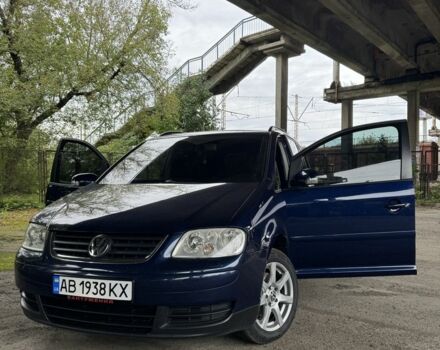 Синий Фольксваген Туран, объемом двигателя 1.6 л и пробегом 233 тыс. км за 4300 $, фото 1 на Automoto.ua