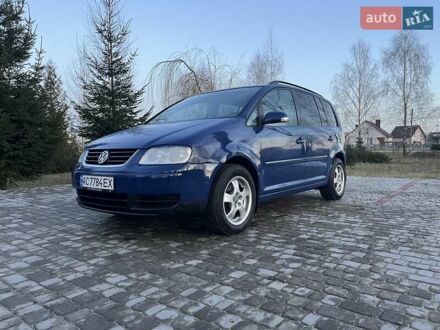 Фольксваген Туран 2005 у Ратне на Automoto.ua Синій Фольксваген Туран, об'ємом двигуна 2 л та пробігом 404 тис. км за 5500 $, фото 1 на Automoto.ua