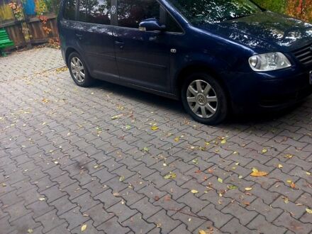 Фольксваген Туран 2005 в Сумах на Automoto.ua Синий Фольксваген Туран, объемом двигателя 1.6 л и пробегом 220 тыс. км за 6299 $, фото 1 на Automoto.ua