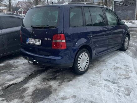 Синій Фольксваген Туран, об'ємом двигуна 2 л та пробігом 300 тис. км за 2800 $, фото 1 на Automoto.ua