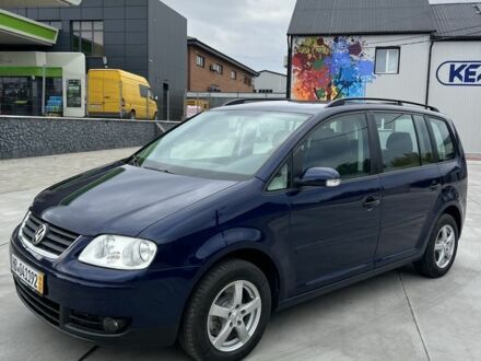 Синий Фольксваген Туран, объемом двигателя 1.6 л и пробегом 247 тыс. км за 7200 $, фото 1 на Automoto.ua