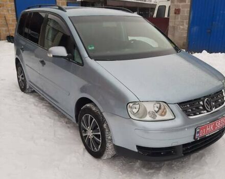 Синий Фольксваген Туран, объемом двигателя 1.6 л и пробегом 233 тыс. км за 5600 $, фото 1 на Automoto.ua