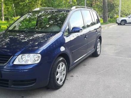 Синий Фольксваген Туран, объемом двигателя 1.4 л и пробегом 261 тыс. км за 6200 $, фото 1 на Automoto.ua