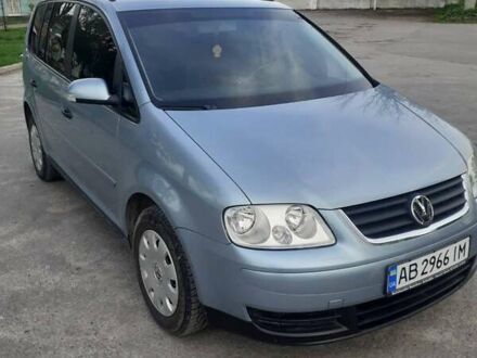 Фольксваген Туран 2006 у Хмельнике на Automoto.ua Синій Фольксваген Туран, об'ємом двигуна 1.6 л та пробігом 164 тис. км за 6900 $, фото 1 на Automoto.ua